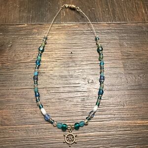 Handmade ocean necklace with pirate ship wheel charm